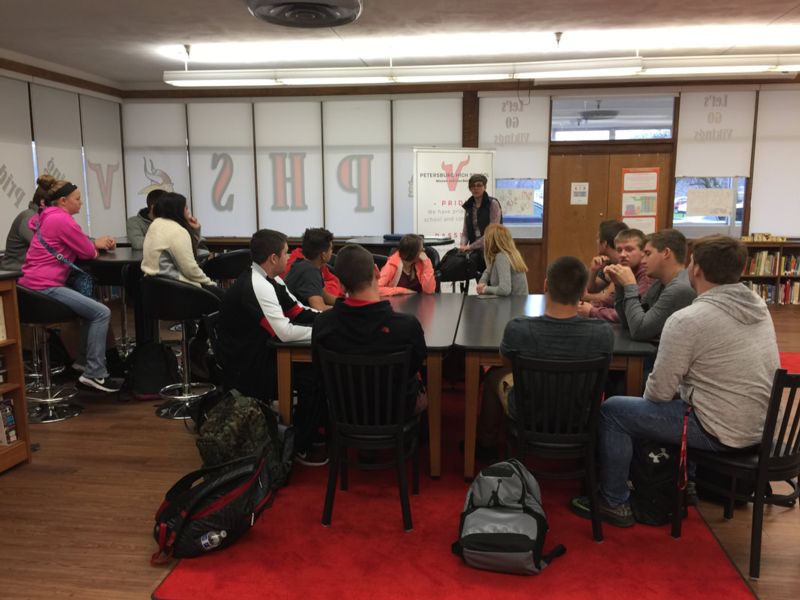 Fairmont State University recruiter with students during College and Career Exploration Week.